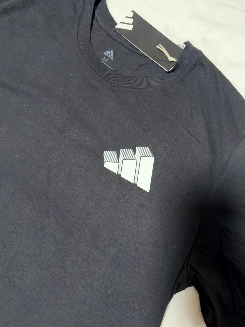 adidas Black Short-Sleeve Tee with White Circular Trefoil Graphic